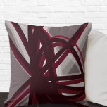 Modern Artistic Abstract Cushion<br><div class="desc">Modern throw pillow features a stylish artistic ribbon design with shades of gray white and burgundy on a grey background. This abstract composition is built on combinations of repeated organic ribbons, which are overlapped and interlaced to form an interesting artistic design. The gray, burgundy, white and wine-colored accents are layered...</div>