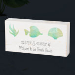 Modern Beach Coordinates Watercolor Sea Life Wooden Box Sign<br><div class="desc">A pretty way to welcome guests to your beach house. With watercolor images of sea grass , tropical fish, and a seashell, it's a simple yet modern way to decorate your place by the sea. In shades or turquoise blue and green it will suit most modern decors. It's light and...</div>