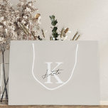 Modern Beige Monogram Bridesmaid Proposal Gift Bag<br><div class="desc">Custom-designed wedding and bridal shower gift bag featuring classic modern style monogram with custom initial and name.</div>