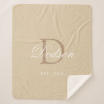 Modern Beige Newlywed Established Year Monogram Sherpa Blanket<br><div class="desc">Modern Beige Newlywed Established Year Monogram Sherpa Blanket Designed with customisable light beige background and light brown monogram initial on the centre. Personalised with couple's last name in classy white calligraphy script lettering and established year is on lower front centre. Makes a great housewarming or bridal shower gift idea. CLICK...</div>