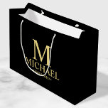 Modern Black and Gold Personalised Groomsman Large Gift Bag<br><div class="desc">Modern Personalised Groomsman Gifts featuring personalised monogram, groomsman's name and title in gold classic serif font style on black background. Also perfect for best man, father of the bride, ring bearer and more. Please Note: The foil details are simulated in the artwork. No actual foil will be used in the...</div>