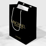 Modern Black and Gold Personalised Groomsman Medium Gift Bag<br><div class="desc">Modern Black and White Personalised Groomsman Gifts featuring personalised groomsman's name, title and wedding date in gold classic serif font style on black background. Also perfect for Best Man, Father of the Bride and more. Please Note: The foil details are simulated in the artwork. No actual foil will be used...</div>