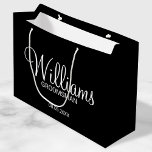 Modern Black and White Personalised Groomsman Large Gift Bag<br><div class="desc">Modern Black and White Personalised Groomsman Gifts
featuring personalised groomsman's name in white modern script font style with title and wedding date in modern sans serif font style on black background.

Also perfect for best man,  father of the bride,  bridesmaid,  maid of honour,  mother of the bride and more.</div>
