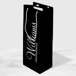 Modern Black and White Personalised Groomsman Wine Gift Bag<br><div class="desc">Modern Black and White Personalised Groomsman Gifts
featuring personalised groomsman's name in white modern script font style with title and wedding date in modern sans serif font style on black background.

Also perfect for best man,  father of the bride,  bridesmaid,  maid of honour,  mother of the bride and more.</div>