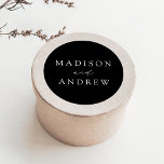 Modern Black and White Personalised Wedding Classic Round Sticker<br><div class="desc">Seal your invitation envelopes or favours with our elegant wedding stickers. The custom wedding stickers feature your names in a white calligraphy script with a black background or colour of your choice. Design coordinates with our Modern Elegance wedding collection.</div>