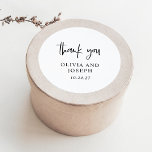 Modern Black and White Wedding Classic Round Sticker<br><div class="desc">These modern,  simple and elegant wedding or bridal shower stickers feature a minimalist black and white text design with stylish handwritten script that says "thank you."</div>