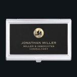 Modern Black Brushed Metallic Gold Monogram Business Card Holder<br><div class="desc">Elevate your professional look with this stylish and practical business card case. Featuring a brushed monogram medallion with your name company and title in classic block typography, this case is a great way to keep your business cards organised and protected. The black background adds a touch of sophistication, while the...</div>