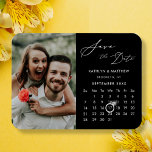 Modern Black Elegant Script Photo Save the Date Magnet<br><div class="desc">Modern Black Elegant Script ‘Save the Date’ Magnet featuring Custom Calendar with a beautiful Photo. Let your family, friends and colleagues know that you have set a date for your wedding celebration with this elegant magnet. To move the Ring marker > click blue ‘Personalise’ > scroll down > click blue...</div>