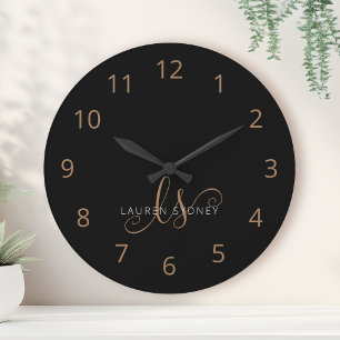 Modern Black Gold Feminine Script Monogrammed Round Clock