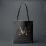 Modern Black Gold Monogram Script Name Initial Tote Bag<br><div class="desc">Modern Black Gold Monogram Elegant Script Name Initial Tote Bag</div>