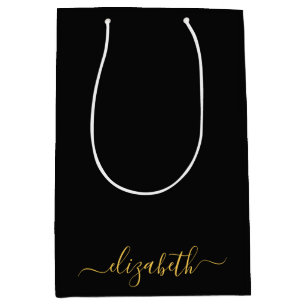 Modern black gold monogram script name medium gift bag