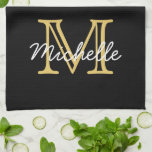 Modern Black Gold Personalised Name Monogrammed Tea Towel<br><div class="desc">Modern, minimalist black and gold custom personalised name and monogrammed kitchen towel. It features a monogram initial in serif style font and a pretty handwritten first name text template in yellow gold, white colour on black background. Great feminine, girly personalised gift. If you need help or matching items, please contact...</div>
