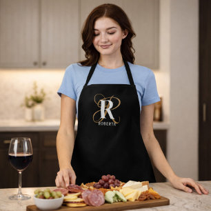 Modern Black Gold Script Monogram Name Apron