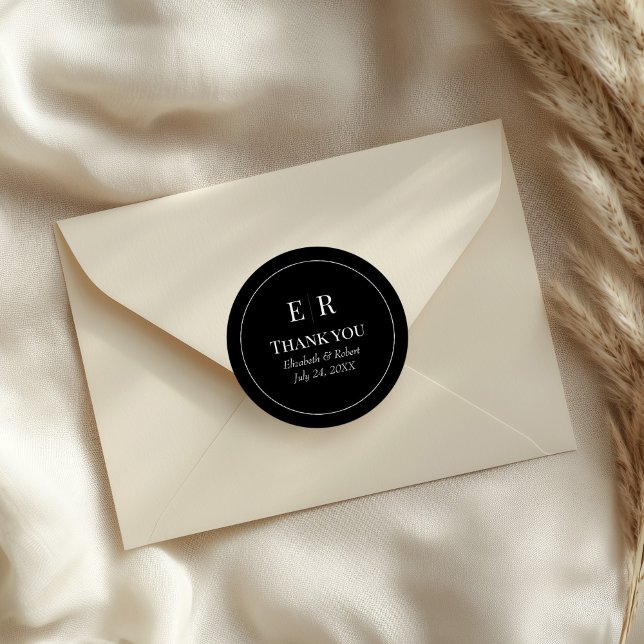 Modern Black Monogram Wedding Thank You Classic Round Sticker (Modern Black Monogram Wedding Thank You Classic Round Sticker on an elegant wedding envelope.)