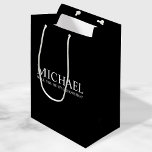 Modern Black Personalised Groomsman Proposal Medium Gift Bag<br><div class="desc">Modern Black and White Personalised Groomsman Proposal Gift Bag
featuring personalised groomsman's name and title in classic serif font style.

Also perfect for bridesmaid,  maid of honour,  flower girl,  best man and ring bearer.</div>