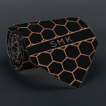 Modern Black Rose Gold Foil Geometric Monogram Tie<br><div class="desc">Modern Black and Rose Gold Foil Geometric Monogram Necktie in a stylish pattern of copper rose gold hexagons on an elegant black background. Easy to customise with text, fonts, and colours. Created by Zazzle pro designer BK Thompson © exclusively for Cedar and String; please contact us at cedarandstring@gmail.com if you...</div>