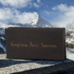 Modern Black Tan Forgiven. Free. Forever. Name Wooden Box Sign<br><div class="desc">You can personalise this with a name or date at the bottom if you desire. This modern stylish Christian faith quote is written in tan golden typography. This inspirational spiritual quote refers to the forgiveness and freedom we have through faith in Jesus Christ. This tan on black "forgiven. free. forever."...</div>