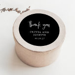 Modern Black Wedding Classic Round Sticker<br><div class="desc">These modern,  simple and elegant dark black wedding or bridal shower stickers feature a minimalist white text design with stylish handwritten script that says "thank you."</div>