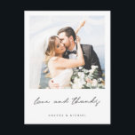 Modern Black White Border Photo Wedding Thank You Postcard<br><div class="desc">This simply chic photo wedding thank you postcard template features a clean, modern design. We've chosen a modern script in black for 'love and thanks' on the front. This part of the design can't be altered. But you can change the colour and font of any other text to suit your...</div>