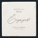 Modern Black & White Calligraphy Engagement Party  Stone Coaster<br><div class="desc">Introducing our Modern Black & White Calligraphy Engagement Party Stone Coaster! Celebrate your engagement party with these elegant and personalised coasters that feature the words "We're Engaged" in beautiful calligraphy. The coaster is designed to be simple yet stylish with a modern touch, making it perfect for any modern wedding reception...</div>