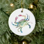 Modern Blue Crab Coastal Christmas Ornament<br><div class="desc">This modern acrylic Christmas ornament features the words Merry Christmas on the back with a replica of my original coastal blue crab art. The type is set in a fun hand lettered typography over a solid blue background. Customise this round ornament with your names to create a unique keepsake for...</div>