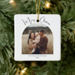 Modern Boho Arch Merry Christmas Ceramic Ornament<br><div class="desc">Celebrate the joy of the season with this modern boho arch Merry Christmas Ceramic Ornament. The unique and chic editable script creates a touch of charm and individuality. Its simple, elegant black-and-white design, featuring a classic bohemian arch frame, evokes a whimsical winter ambiance. The minimal and delicate festive font adds...</div>