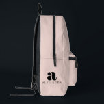 Modern Bold Blush Pink Monogram Name Printed Backpack<br><div class="desc">A bold modern monogram and name combination. The large bold monogram pairs with a sleek modern font choice for your name. Create a design that shows the world who you are.</div>