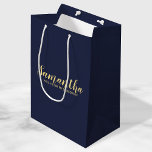 Modern Bridesmaid Proposal Medium Gift Bag<br><div class="desc">Modern Bridesmaid Proposal Gift Bag features personalised bridesmaid's name in gold modern script font style on navy blue background. Also perfect for maid of honour, flower girl, groomsman, best man and ring bearer. Please Note: The foil details are simulated in the artwork. No actual foil will be used in the...</div>