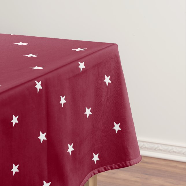 Modern burgundy & white stars pattern holiday tablecloth (In Situ)