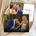 Modern Chic Script 2 Photo Wedding Thank You Card<br><div class="desc">Modern Elegant Chic Calligraphy Script Wedding 2 Photo Thank You Card. Stylish wedding thank you template featuring a full vertical photo on the front with the text "Thank You" in a whimsical swirly hand lettering typography script swash tail font in white overlay on the picture and a reverse side one...</div>