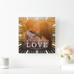 Modern Chic Wedding All you need is Love Photo<br><div class="desc">Forget the cliché chocolates, honey! Spice up your Valentine's with a clock that sings "All You Need is Love" in modern style! Picture your dreamy wedding pic surrounded by sleek lines and cool fonts, whispering sweet nothings every hour. It's a love story frozen in time, adorning your wall instead of...</div>