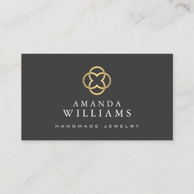 Modern Clover Gold Logo Luxury Boutique Dark Grey Business Card (Front)
