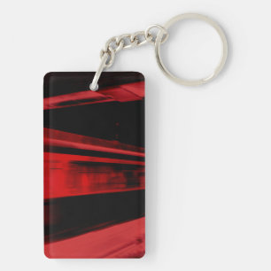 Modern, cool motion concept in red and black key ring