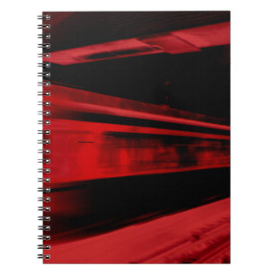 Modern, cool motion concept in red and black notebook