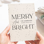 Modern Cream Merry and Bright Non-Photo Holiday Card<br><div class="desc">Modern holiday card featuring "Merry and Bright" displayed in black lettering and cream background with subtle black dots (snow). Personalise the front of the non-photo holiday card with your family name and the year in black lettering. The card reverses to display your personal message in black lettering or leave it...</div>