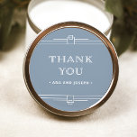 Modern Deco | Elegant Dusty Blue and White Wedding Classic Round Sticker<br><div class="desc">These glamourous wedding stickers feature a modern spin on classic art deco. Ornate,  white geometric borders and ornamentation decorate an elegant dusty blue background for a dramatic,  vintage wedding look. Classic white typography says "thank you",  making these perfect to add to your wedding favours.</div>