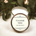 Modern Deco | Elegant Ivory and Black Wedding Classic Round Sticker<br><div class="desc">These glamourous wedding stickers feature a modern spin on classic art deco. Ornate,  black geometric borders and ornamentation decorate an elegant ivory background for a dramatic,  vintage wedding look. Classic black typography says "thank you",  making these perfect to add to your wedding favours.</div>