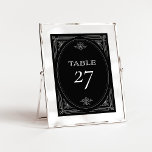 Modern Deco | Elegant Onyx Black and White Wedding Table Number<br><div class="desc">These glamourous wedding table numbers feature a modern spin on classic art deco. An ornate,  white geometric frame and ornamentation decorate an elegant dark onyx black background for a dramatic,  vintage wedding look.</div>