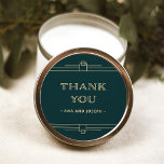 Modern Deco | Emerald Green and Champagne Wedding Classic Round Sticker<br><div class="desc">These glamourous wedding stickers feature a modern spin on classic art deco. Ornate,  faux champagne gold look geometric borders and ornamentation decorate an elegant emerald green background for a dramatic,  vintage wedding look. Classic faux champagne gold typography says "thank you",  making these perfect to add to your wedding favours.</div>