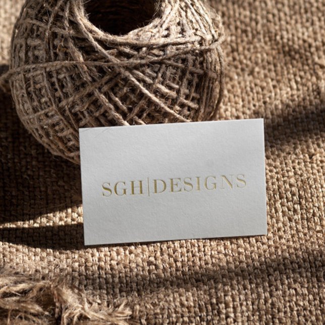 Modern Designer Minimal White & Gold Embossed Text Business Card (Creator Uploaded)