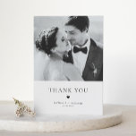 Modern Elegance Black Typography Wedding Thank You<br><div class="desc">Modern Elegance Black Typography Wedding Thank You Card | Send thanks to family and friends for being part of your special day with this customisable wedding thank you card. It features minimalist typography with heart illustration. Feature your favourite wedding photo in the front of the card and add another photo...</div>
