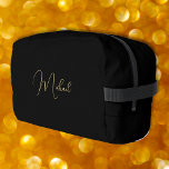 Modern Elegant Black Gold Monogram Travel Cosmetic Dopp Kit<br><div class="desc">Create your own custom, personalised, beautiful modern elegant faux gold script / typography monogram monogrammed, durable Polyester Poplin, sturdy polyester fabric mens womens kids solid plain black cosmetic makeup toiletry organiser golf beach accessory gym travel dopp kit bag pouch with a zippered closure, two interior mesh pockets - one zippered...</div>