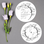 Modern Elegant Floral Circle Branch Wedding Invitation<br><div class="desc">This elegant and modern wedding invitation is perfect for the spring or summer. It features hand-drawn delicate line art flowers and leaves on a circle branch. The colour scheme is black and white, and the typography includes a cursive script with a matching serif font. It's simple, pretty, minimal, and stylish;...</div>