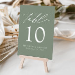 Modern Elegant Sage Green Wedding Table Number<br><div class="desc">Trendy, minimalist wedding table number cards featuring white modern lettering with "Table" in a modern calligraphy script. The design features a sage green background or colour of your choice. The design repeats on the back. To order the table cards: add your name, wedding date, and table number. Add each number...</div>