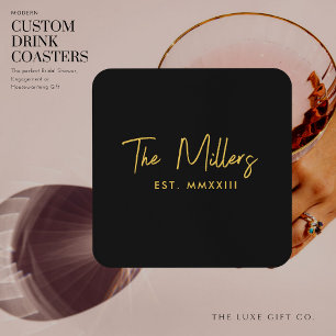 Modern Elegant Script Black and Gold Monogram Coaster