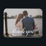 Modern Elegant Script Thank You Photo Wedding Magnet<br><div class="desc">Modern photo wedding favour magnet featuring "thank you" in an elegant typography script with swashes along with your names and wedding date in white over your favourite horizontal picture.  These custom magnets make useful wedding favours and are great for any style of wedding.</div>