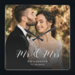 Modern Elegant Script Wedding Photo Newlywed Chic  Square Wall Clock<br><div class="desc">This elegant script custom photo wall clock will be a beautiful keepsake of your wedding day! The unique calligraphy reads 'Mr and Mrs' alongside your personal family name. Add your favourite wedding photo and make this into a perfect gift for newlyweds,  an anniversary,  or vow renewal!</div>