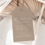 Modern Elegant Taupe Wedding Welcome Gift Tags<br><div class="desc">These elegant calligraphy wedding welcome gift tags are perfect for both casual and formal weddings. The design features a modern white calligraphy script with a taupe background or colour of your choice. Personalise the taupe wedding welcome gift tags with a short welcome message, your names, etc. The minimalist wedding gift...</div>