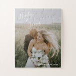 Modern Elegant Wedding Newlywed Photo Jigsaw Puzzle<br><div class="desc">Jigsaw puzzle with a modern and simple design featuring your names in an elegant handwritten script across the top left and your wedding date in the bottom right, over your favourite wedding photo. The chic hand lettering adds a romantic touch. This puzzle makes a fun gift for a newlywed couple...</div>