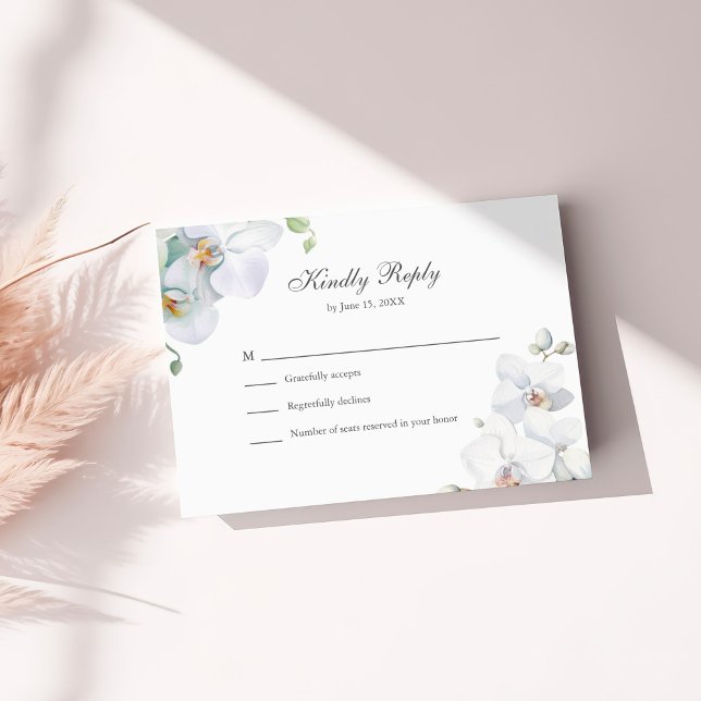 Modern Elegant White Orchids Wedding RSVP Card (Modern Elegant White Orchids Wedding RSVP Card on a sunny white table with dry flowers.)